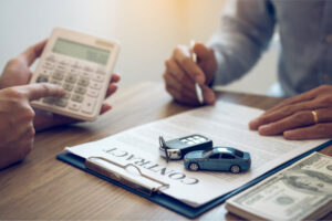 finance manager of the car showroom is calculating 2021 09 03 12 54 29 utc.jpg